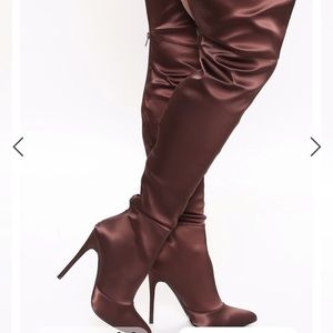 Thigh high heeled boots